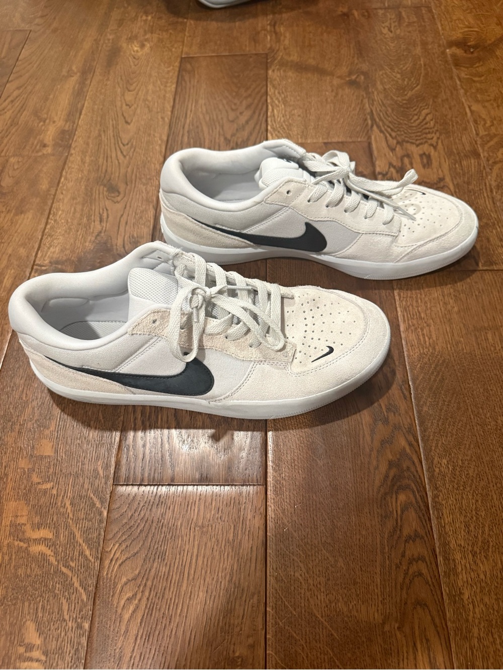 Nike Men’s White Sneakers with Black Swoosh
